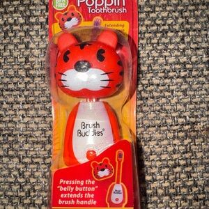 Brush Buddies Poppin Toothbrush - Red/White Toothy Toby Tiger